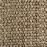 Close-up of a densely woven beige jute carpet texture.