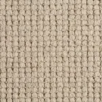 Close-up texture of a chunky light grey wool loop pile carpet.