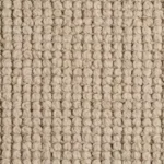 Close-up texture of a chunky taupe wool loop pile carpet.