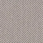Close-up texture of a cool grey wool herringbone carpet.