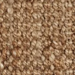 Close-up texture of a natural beige jute carpet.