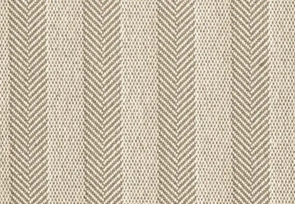 Close-up texture of a striped light grey wool chevron carpet.