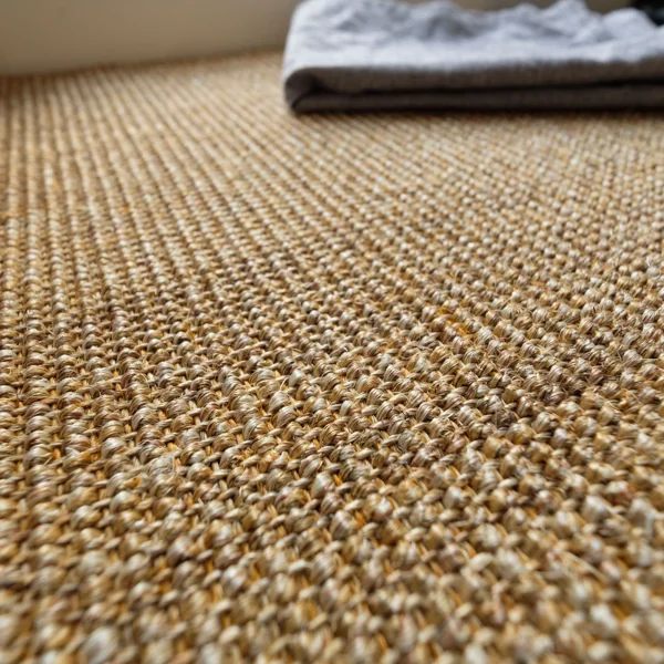 Close up view of natural jute wall to wall carpet