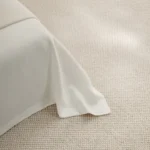 Harvest Cream Mix wall to wall carpet beside modern bed
