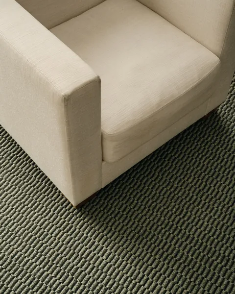 Harvest Moss White wall to wall carpet with cream armchair