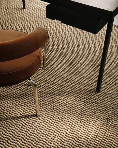 Harvest Natural White wall to wall carpet under office desk