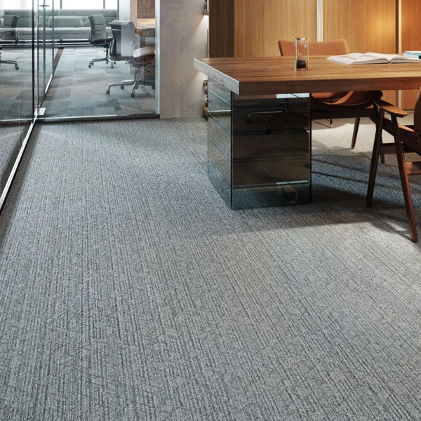 Textured grey wool wall to wall carpet in executive office