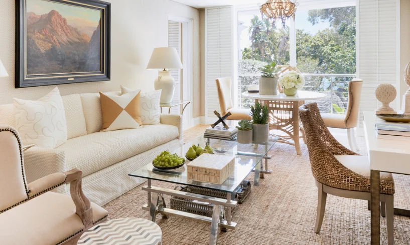 Textured natural jute carpet flooring installed in a bright, sunlit living room