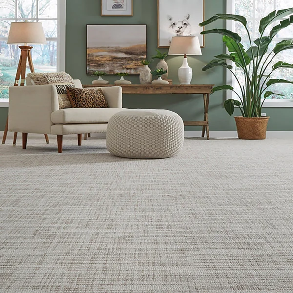Neutral woven texture wool wall to wall carpet in lounge